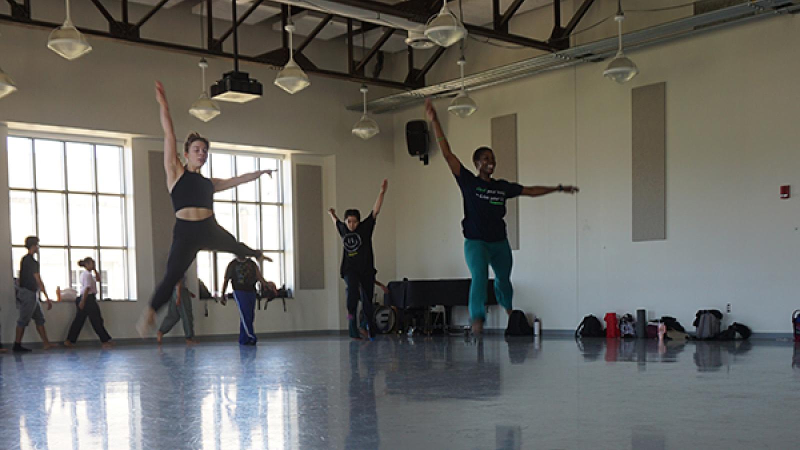 Dancers rehearsing in a studio